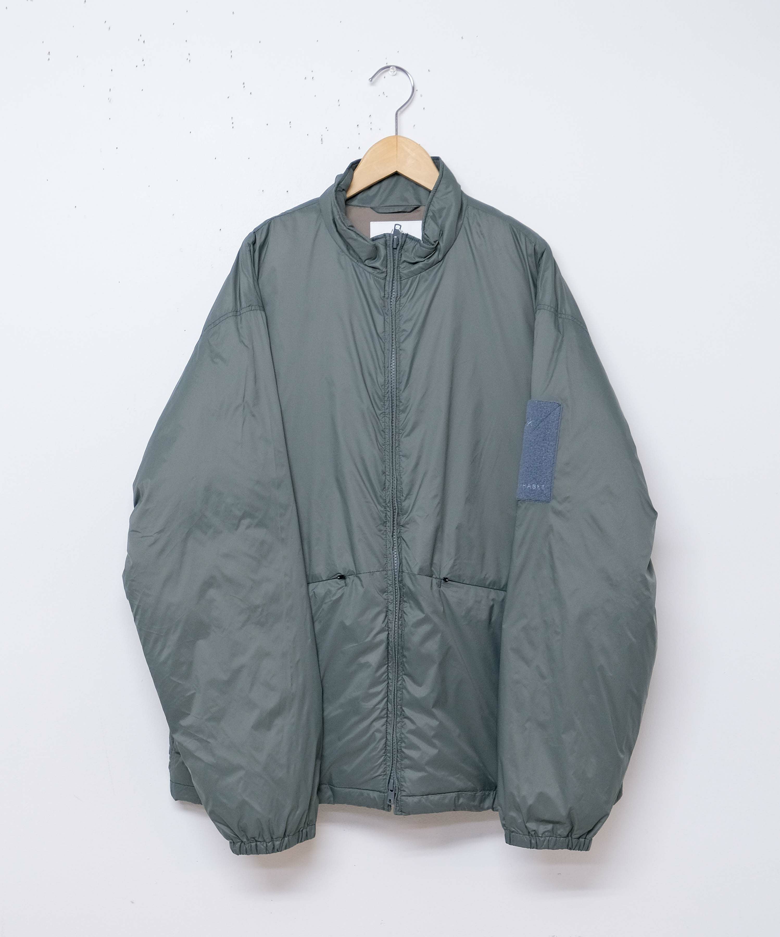 NANGA × MANUAL ALPHABET｜EQUIPMENT DOWN TRACK JACKET [[MA-J-411